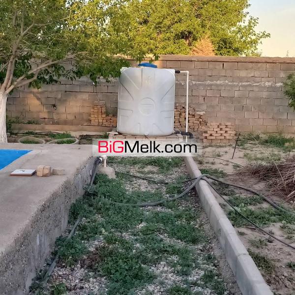 ۱۹۸۰ متر باغچه با ۱۴۰متر بنا آب برق گاز سند تک برگ رسمی