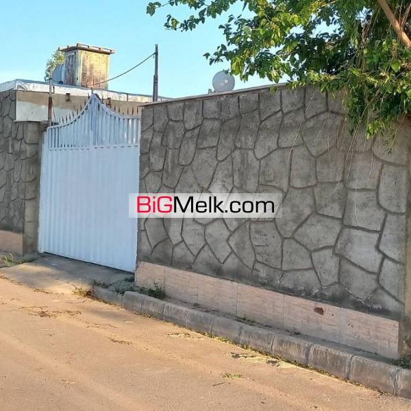 ۱۹۸۰ متر باغچه با ۱۴۰متر بنا آب برق گاز سند تک برگ رسمی
