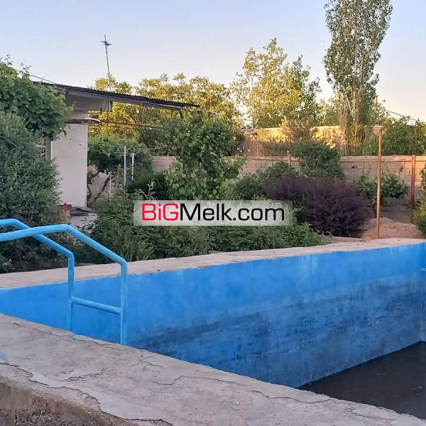 ۱۹۸۰ متر باغچه با ۱۴۰متر بنا آب برق گاز سند تک برگ رسمی