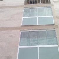 پوشش بالکن با شیشه های ریلی(تاشو